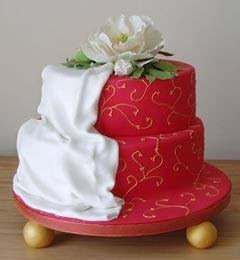 small red two tier wedding cake