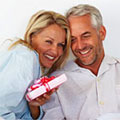 Wedding Anniversary- Couple Exchanging Gifts