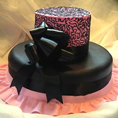 Two tier black and pink wedding cake