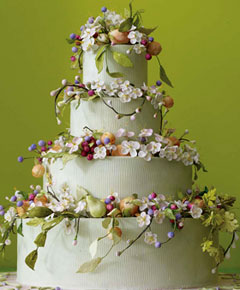 Four tier floral cake with fresh flowers