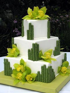 three tier square white and olive green wedding cake