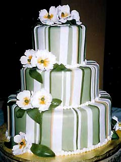 three tier round striped green and white wedding cake