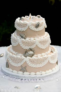 Three tier beige and white seashell cake