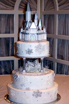 Three tier silver and winter white snowflake princess castle cake