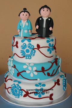 Japanese theme, three tier white and blue fondant wedding cake