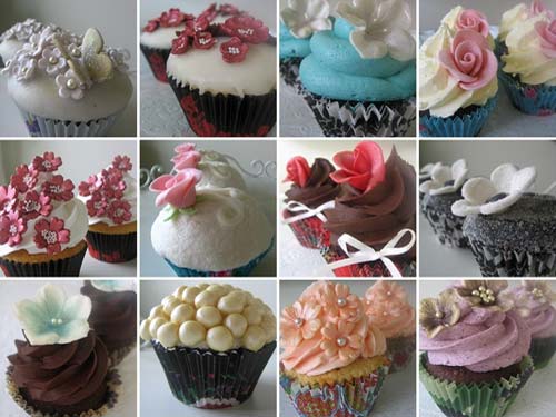 A gorgeous assortment of cupcake wedding cakes in all colours; pink, blue, lilac, orange, ivory, chocolate brown and black. From O'holysweet www.flickr.com
