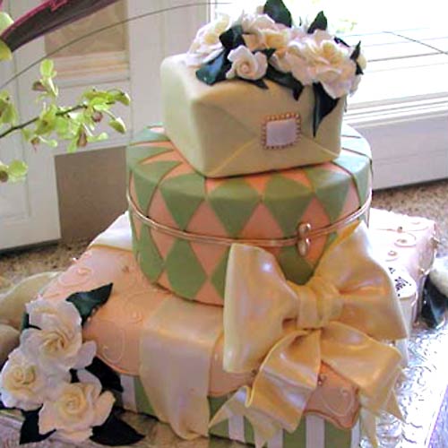 Romantic wedding cake made to lool like a gift box wedding cake