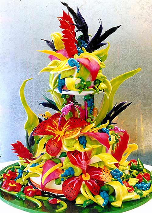 Two tier, tropick Birds of Paradise summer theme wedding cake, all edible chocolate, sugar flowers