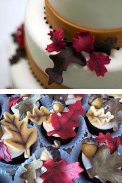 White three tier autumn themed wedding cake decorated with red, brown and tan hand crafted fondant leaves
