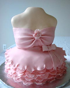 Four tier embroidery wedding cake. The wedding dress cake design based on a couture wedding dress