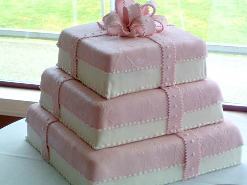 three tiered square pink gift box wedding cake
