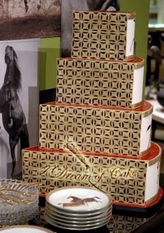 Unusally shaped four tier gold, white and brown art deco wedding cake