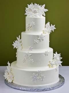 Simple four tier snow white snowflake cake