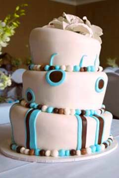 white and blue topsy turvy cakes