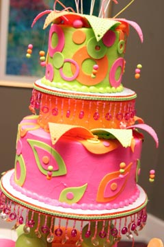 Funky, psychedelic three tier pink, orange & green wedding cake