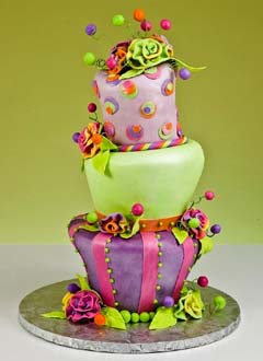 Pink, purple and green whimsical cake design created with a whimsical theme wedding